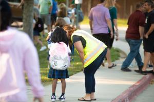 Parent volunteering for traffic duty at North Star Academy