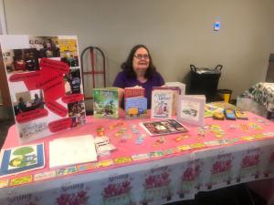 Woman at table for GFWC event